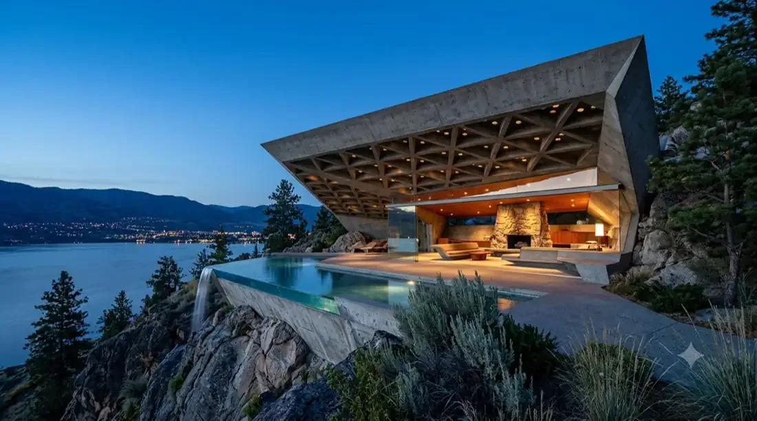 Sheats–Goldstein Residence — coffered concrete roof cantilevered over the bluff, infinity pool spilling toward the lake